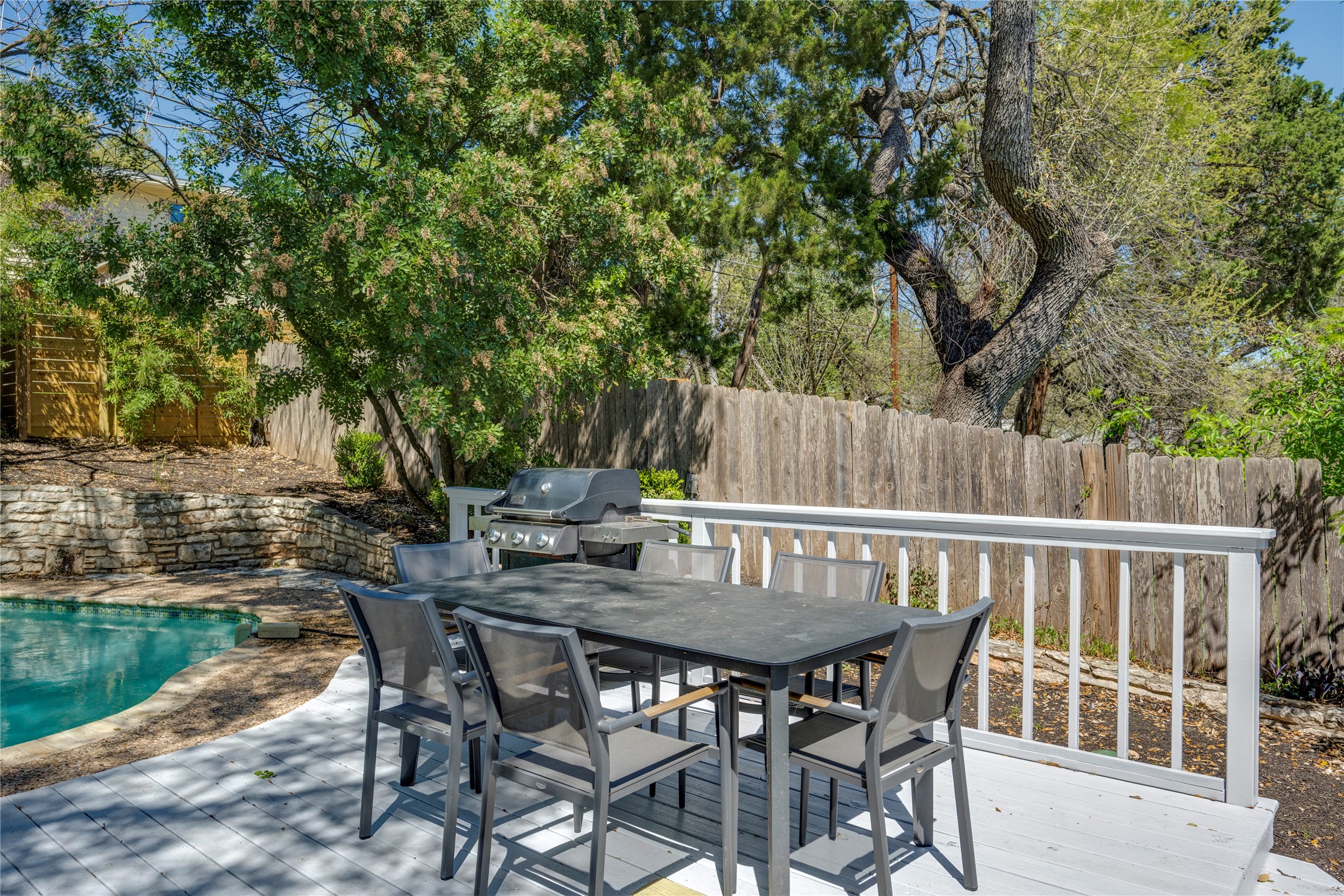 3606 Wilson Street Austin, TX 78704 - Photo 32 of 34 Wooden terrace with a fenced backyard, area for grilling, a patio, and outdoor dining space
