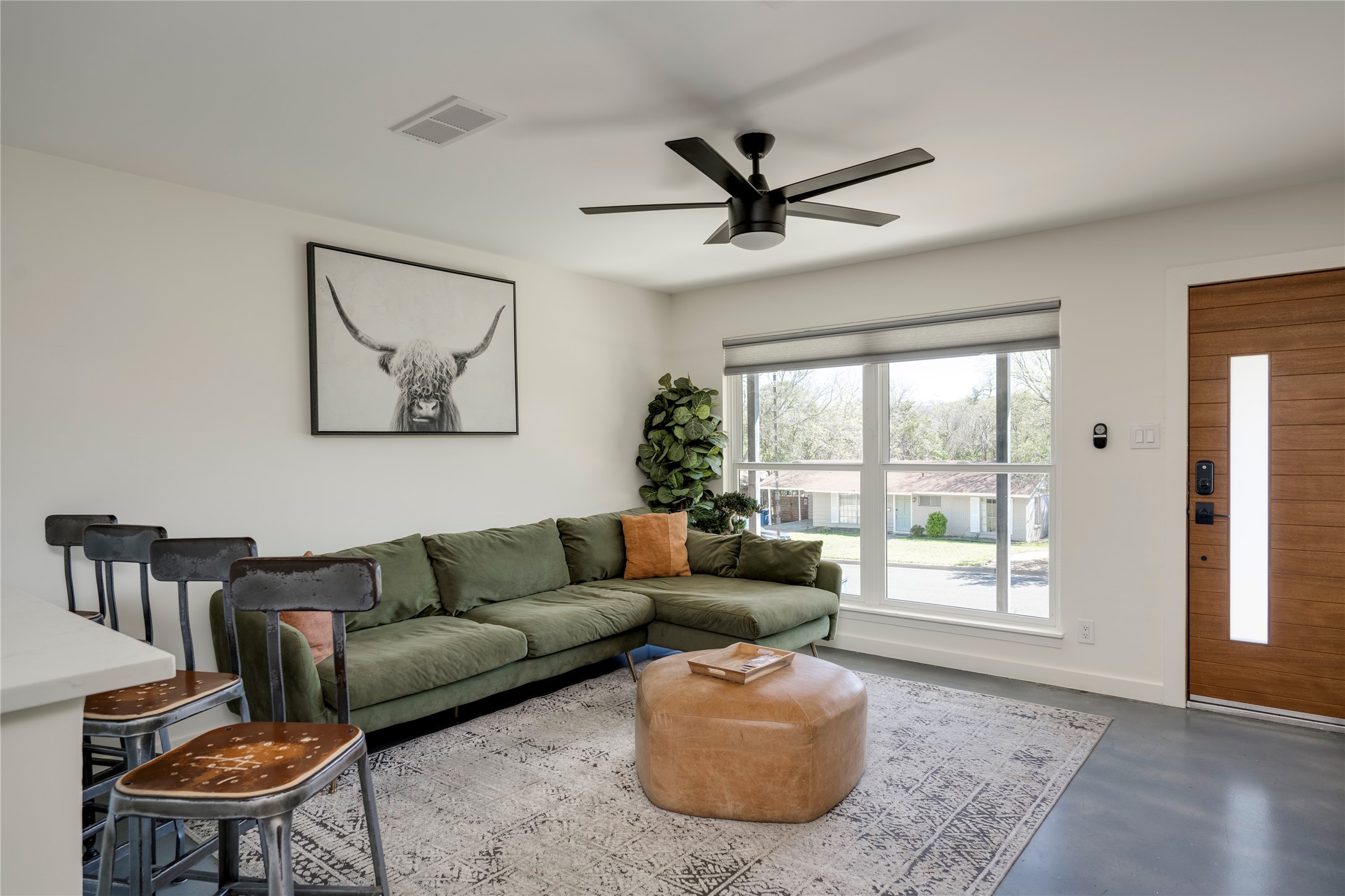 3606 Wilson Street Austin, TX 78704 - Photo 5 of 34 Living room with concrete flooring and a ceiling fan