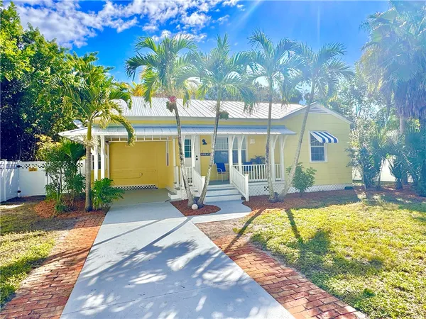a view of a house with swimming pool