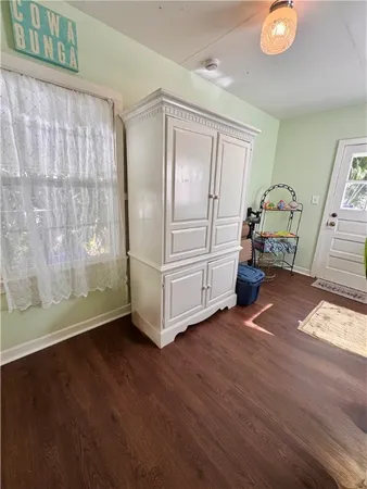 a view of livingroom with furniture and wooden floor