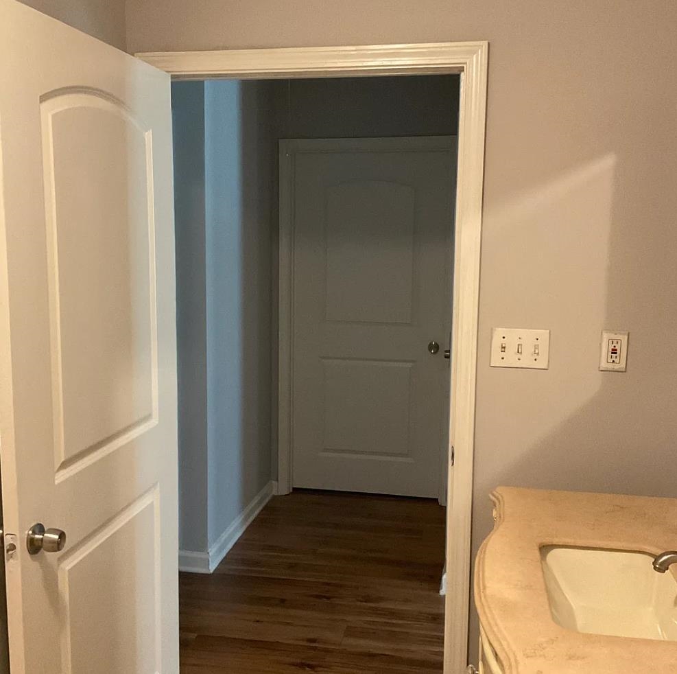 1521 Hope Street Memphis, TN 38111 - Photo 7 of 9 a view of a hallway with wooden floor