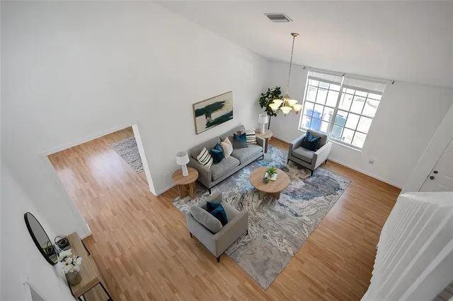 a living room with furniture and window