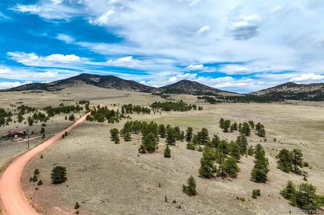 a view of a lake with mountains in the background