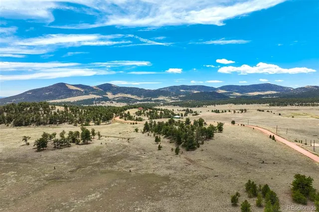 a view of a lake with sunset
