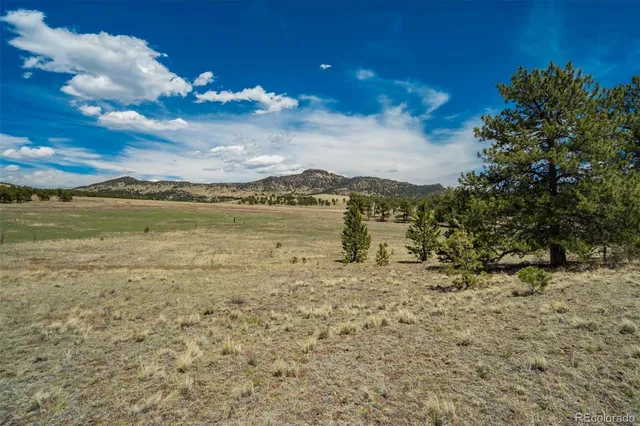 a view of ocean with mountains