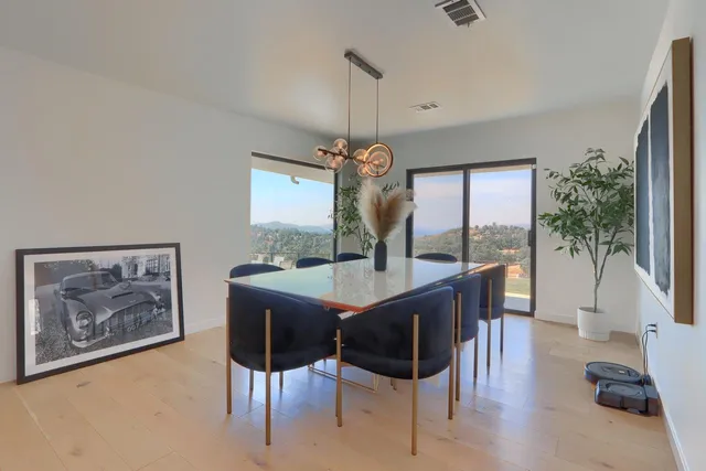 a view of an empty room and fire place