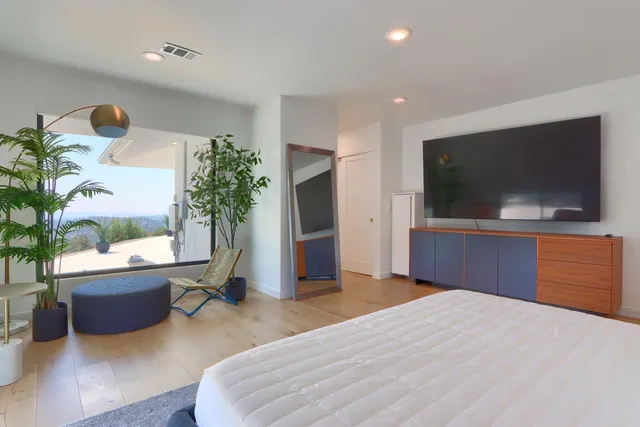 a view of a backyard of the house