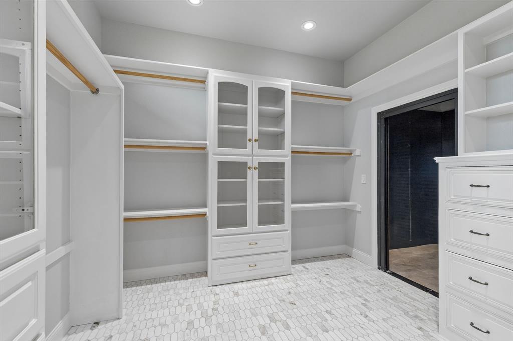 12877 Foutch Road Pilot Point, TX 76258 - Photo 19 of 40 Primary closet with built in walk in safe