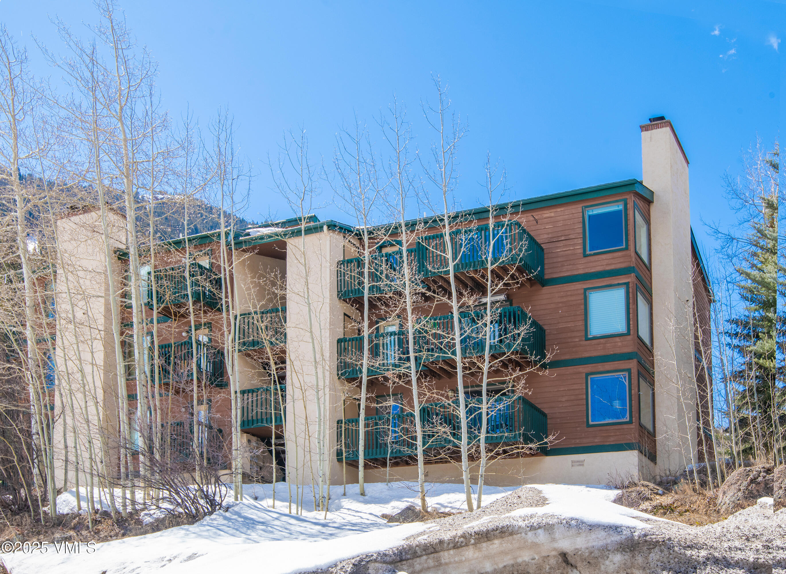 4479 Timber Falls Court, Unit 2001 Vail, CO 81657 - Photo 20 of 27 a front view of a building with street