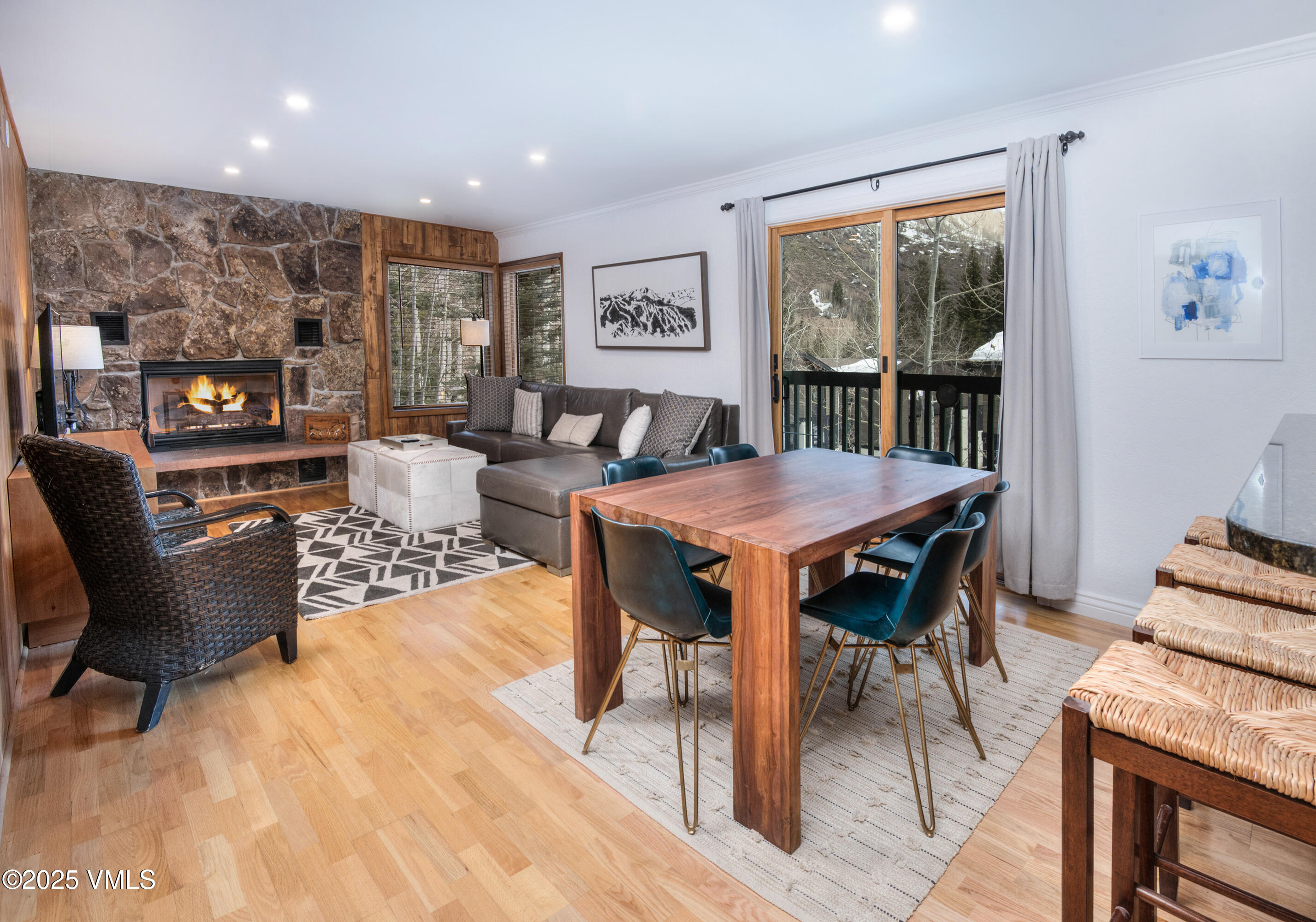 4479 Timber Falls Court, Unit 2001 Vail, CO 81657 - Photo 3 of 27 a view of a dining room with furniture window and wooden floor