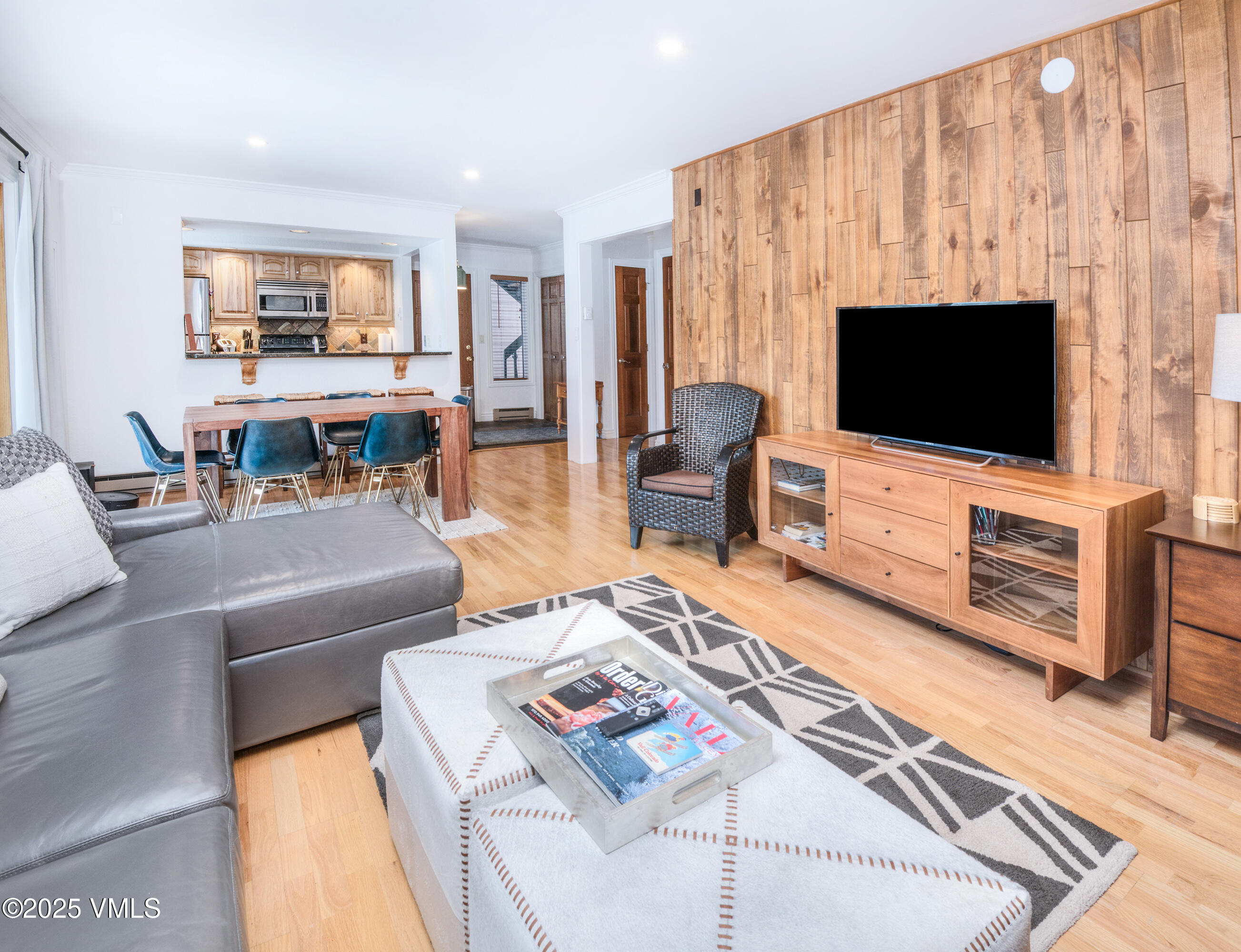 4479 Timber Falls Court, Unit 2001 Vail, CO 81657 - Photo 6 of 27 a living room with furniture and a flat screen tv