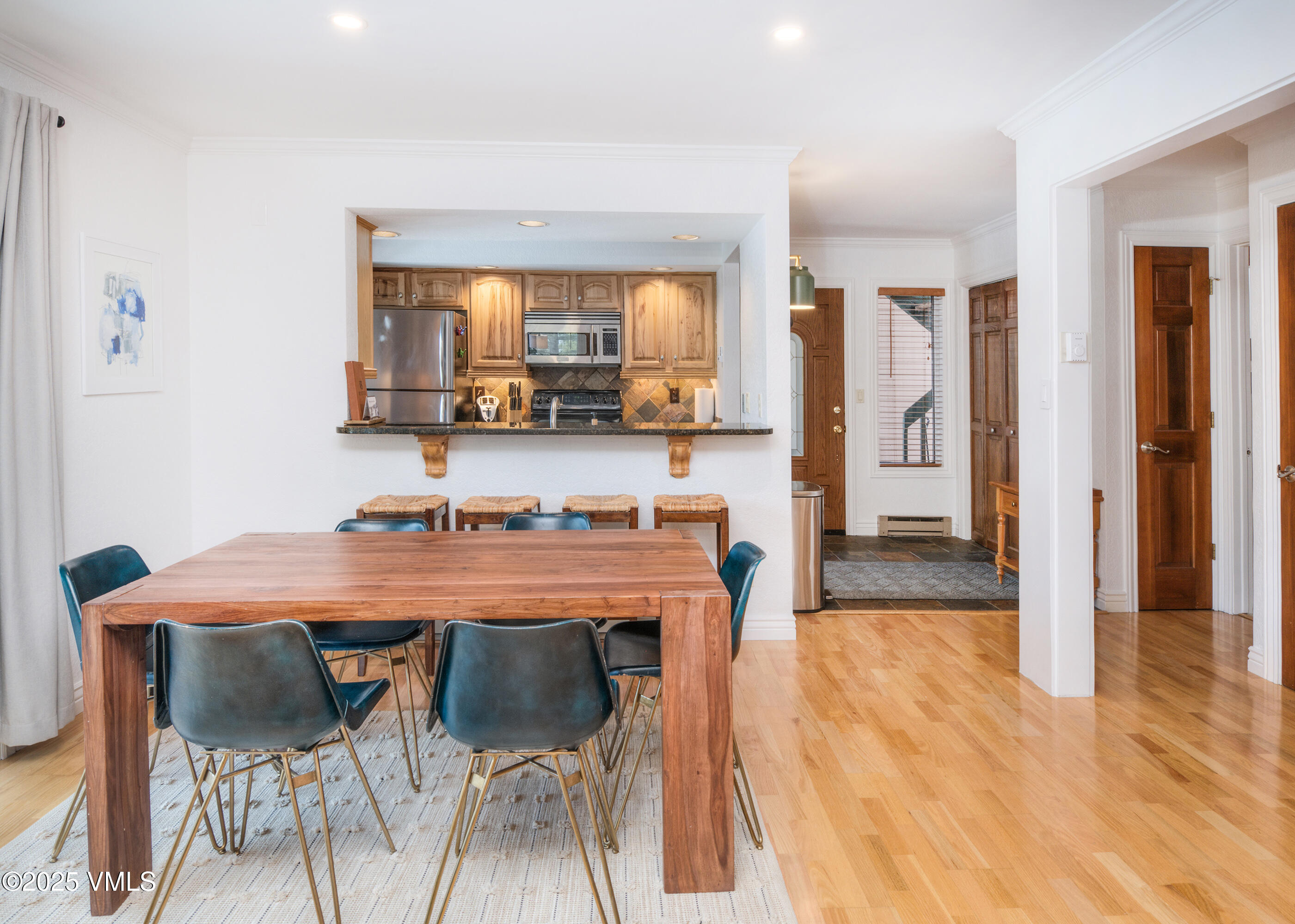 4479 Timber Falls Court, Unit 2001 Vail, CO 81657 - Photo 7 of 27 a view of a kitchen and dining room