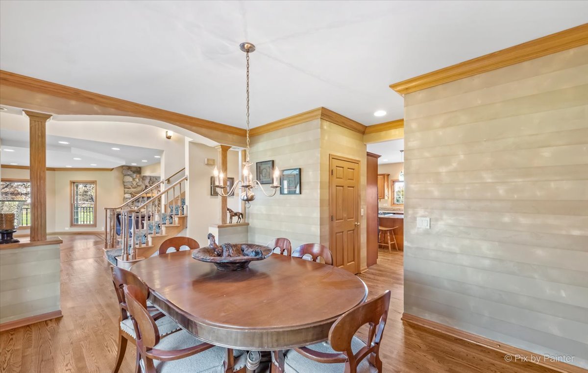 9N523 Kendall Road Elgin, IL 60124 - Photo 13 of 60 a view of a dining room with furniture and wooden floor