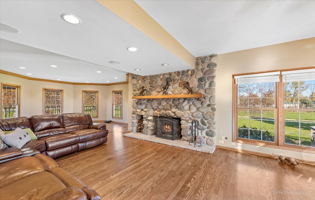 9N523 Kendall Road Elgin, IL 60124 - Photo 16 of 60 a living room with furniture and a fireplace