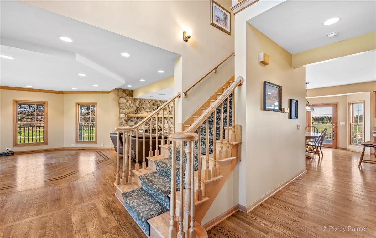 9N523 Kendall Road Elgin, IL 60124 - Photo 17 of 60 a view interior of a house an entryway and hall with wooden floor