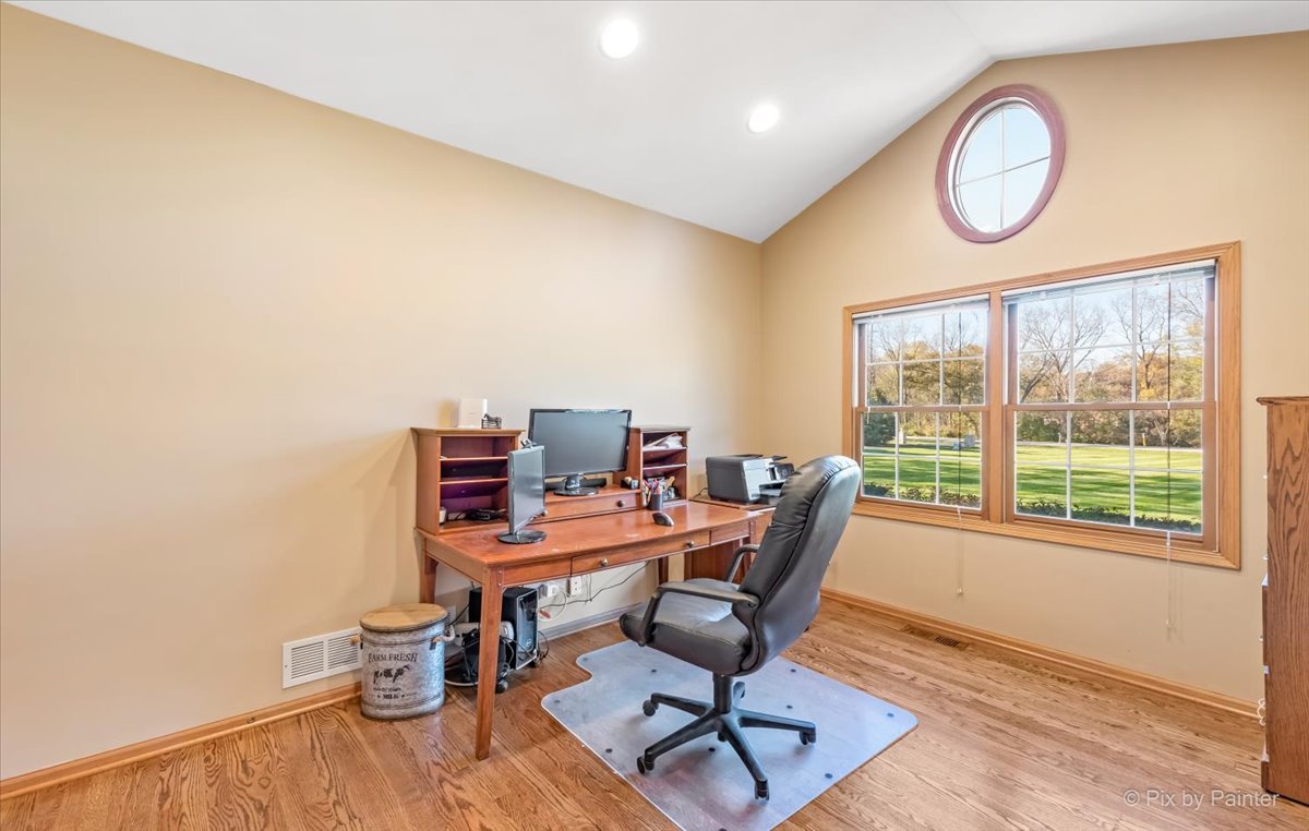 9N523 Kendall Road Elgin, IL 60124 - Photo 18 of 60 a view of a workspace with furniture and a window