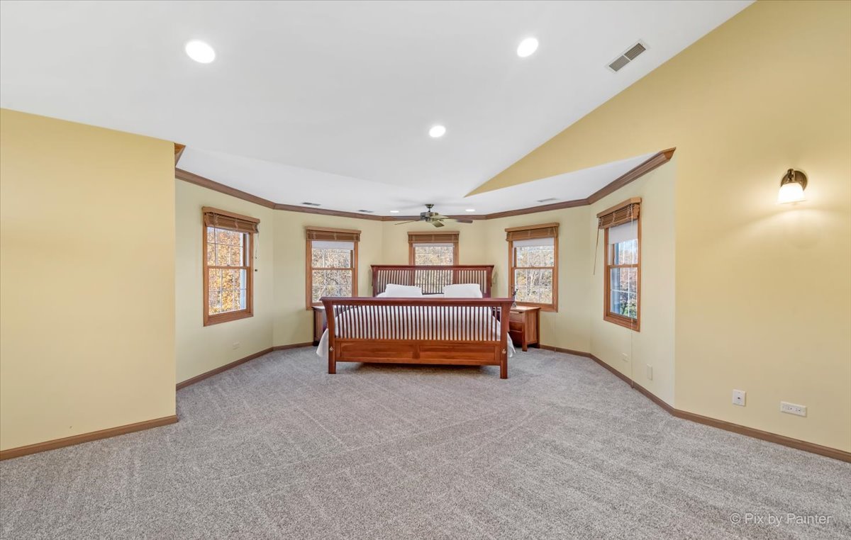 9N523 Kendall Road Elgin, IL 60124 - Photo 20 of 60 a bedroom with a bed and a night stand