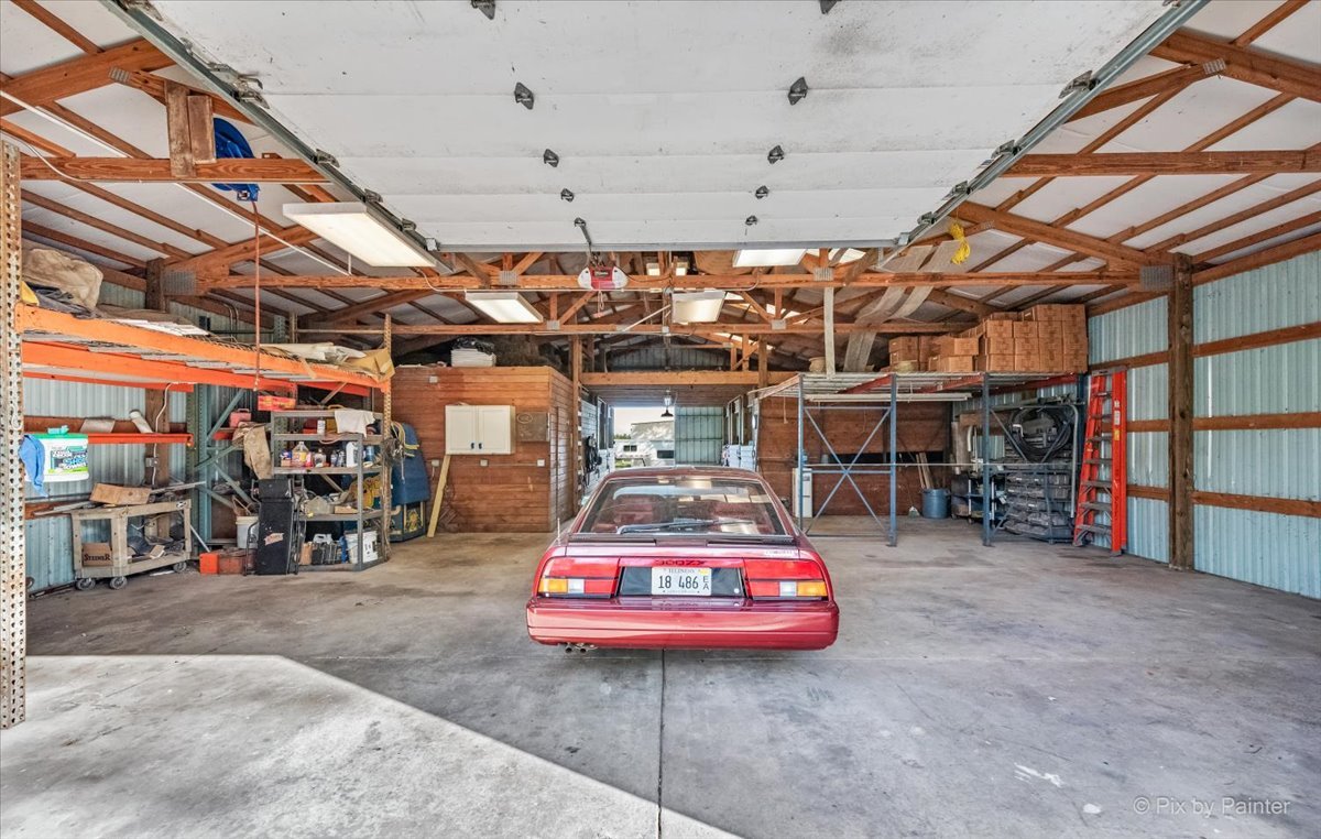 9N523 Kendall Road Elgin, IL 60124 - Photo 45 of 60 a view of a garage with a table and chairs