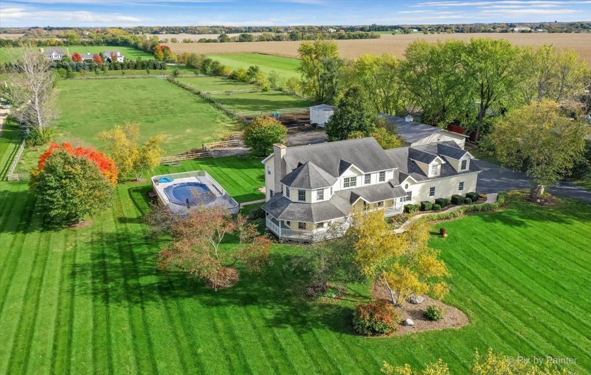9N523 Kendall Road Elgin, IL 60124 - Photo 52 of 60 an aerial view of residential houses with outdoor space and trees