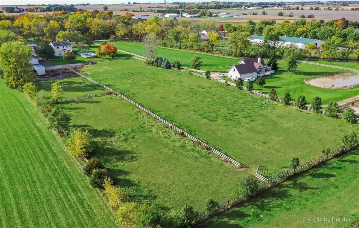 9N523 Kendall Road Elgin, IL 60124 - Photo 57 of 60 a view of a garden with a building in the background