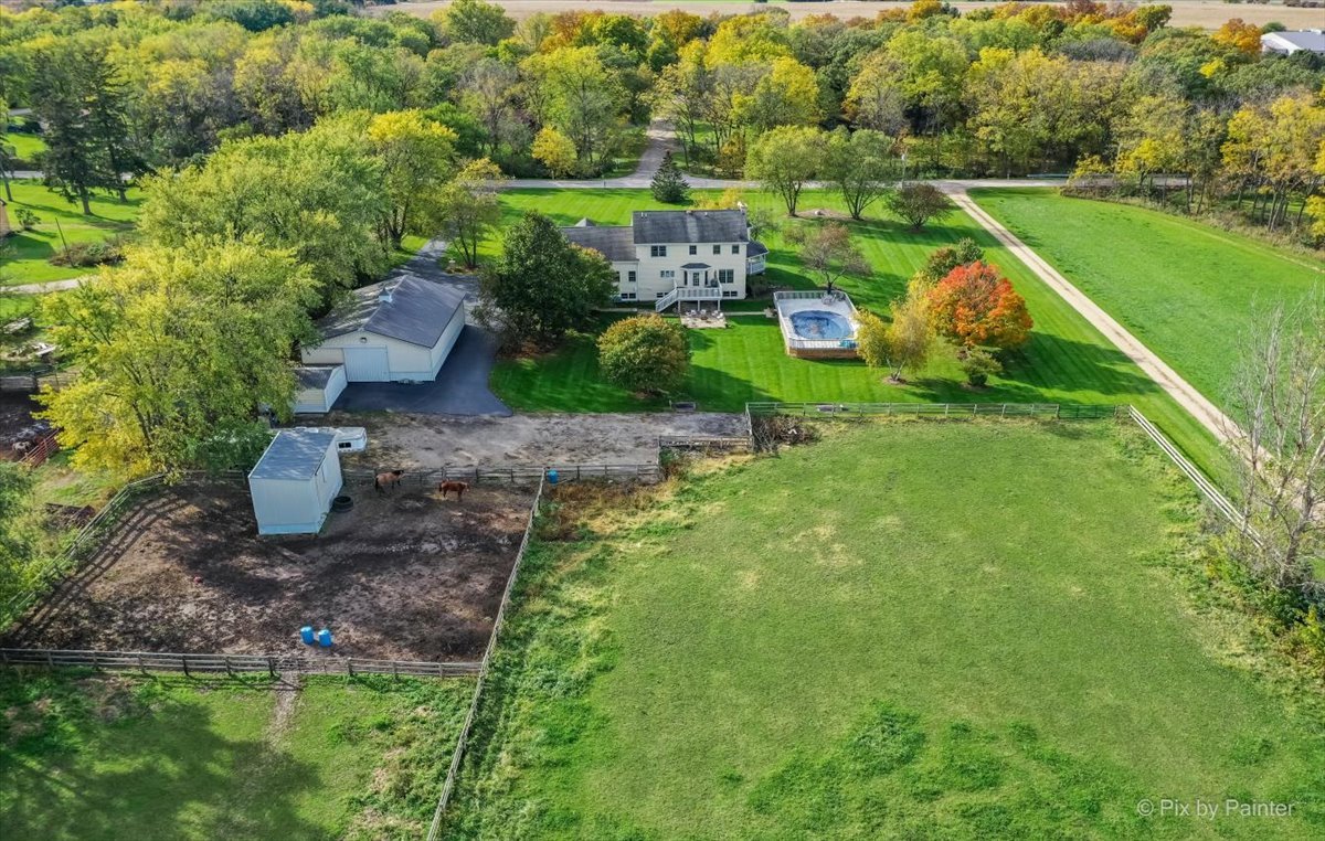 9N523 Kendall Road Elgin, IL 60124 - Photo 58 of 60 an aerial view of a house with swimming pool a yard and outdoor seating