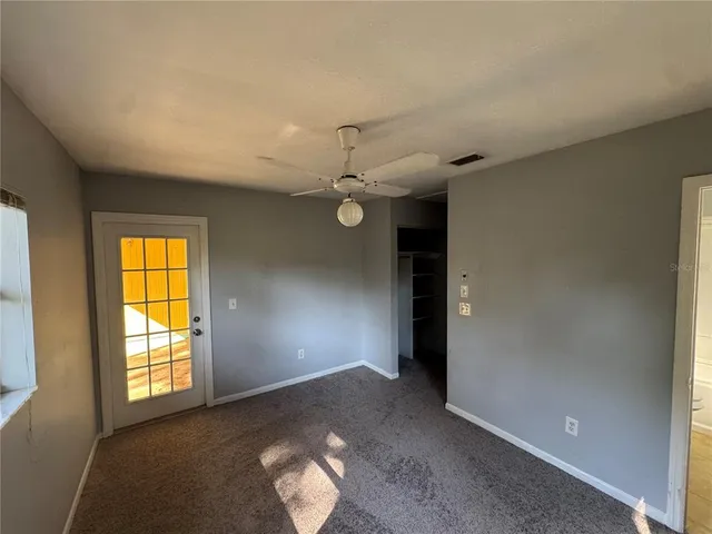 an empty room with windows