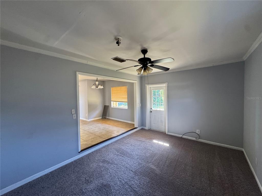 301 Hickory Lane Seffner, FL 33584 - Photo 12 of 14 a view of an empty room with a window