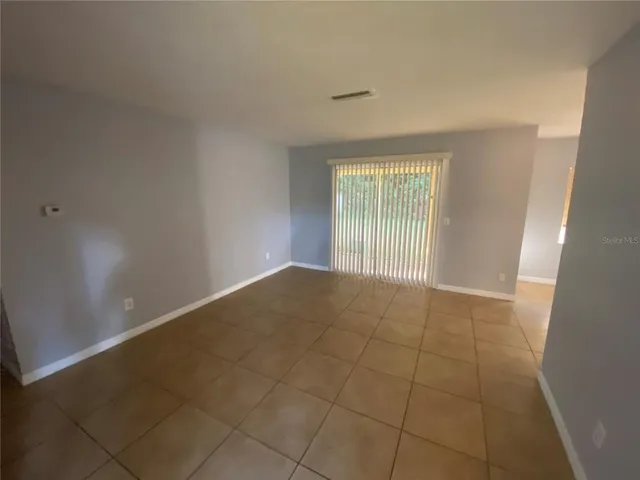 en empty room with windows