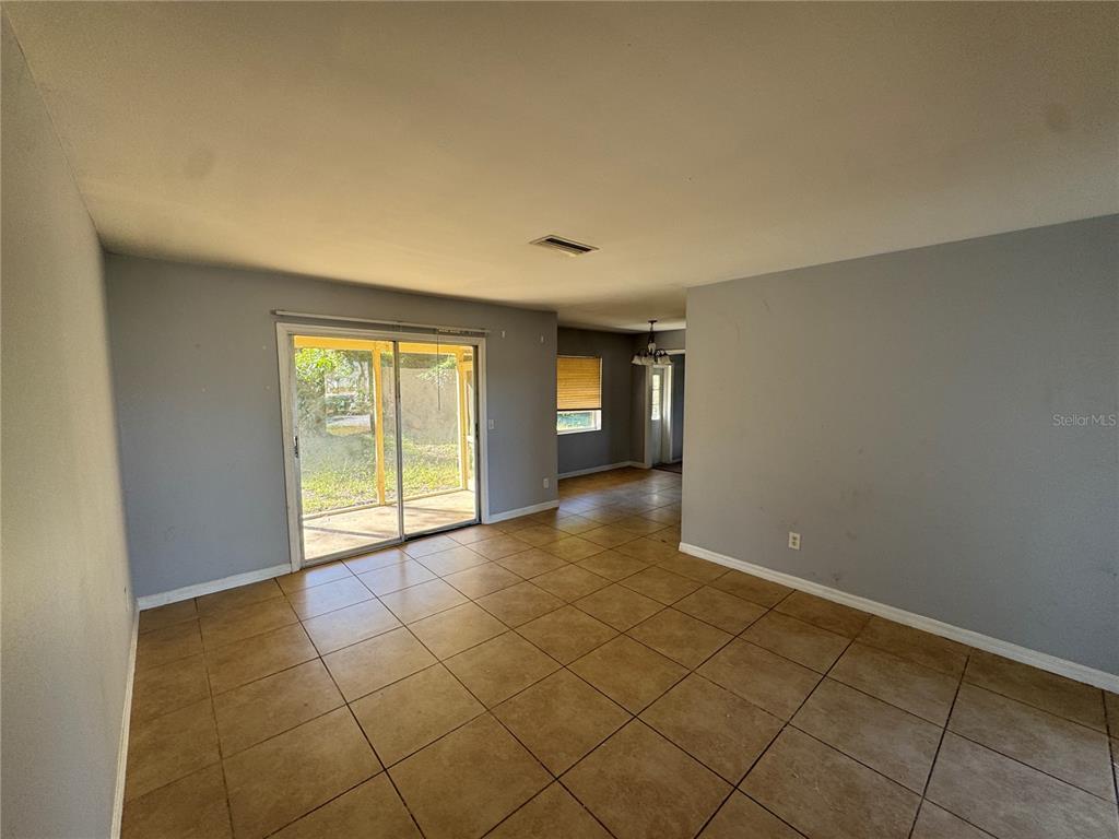 301 Hickory Lane Seffner, FL 33584 - Photo 3 of 14 a view of an empty room and window