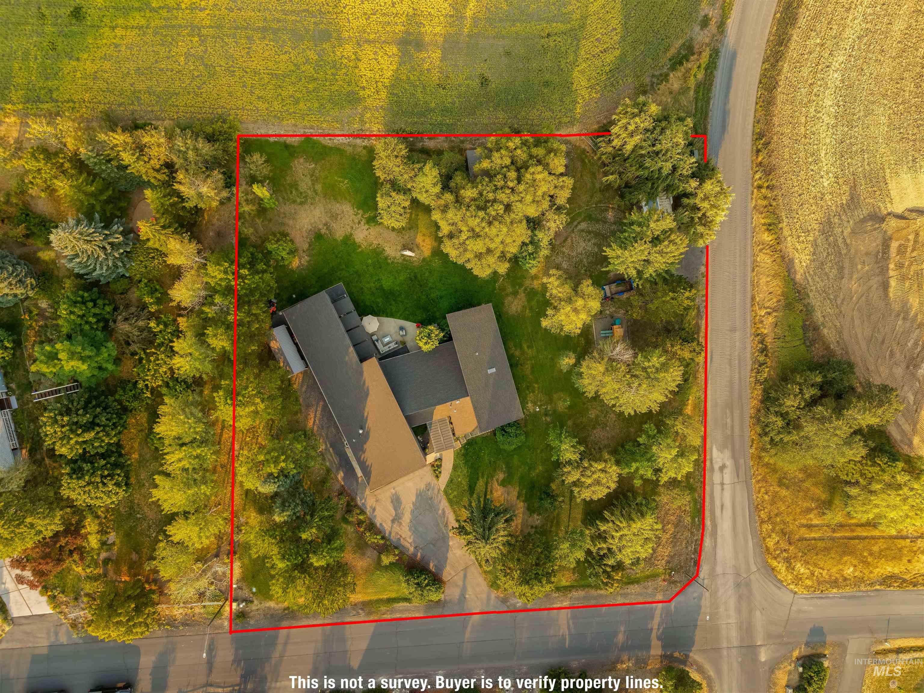 2048 Arborcrest Road Moscow, ID 83843 - Photo 49 of 50 Expansive lot featuring mature trees, a private driveway, and a multi-level structure