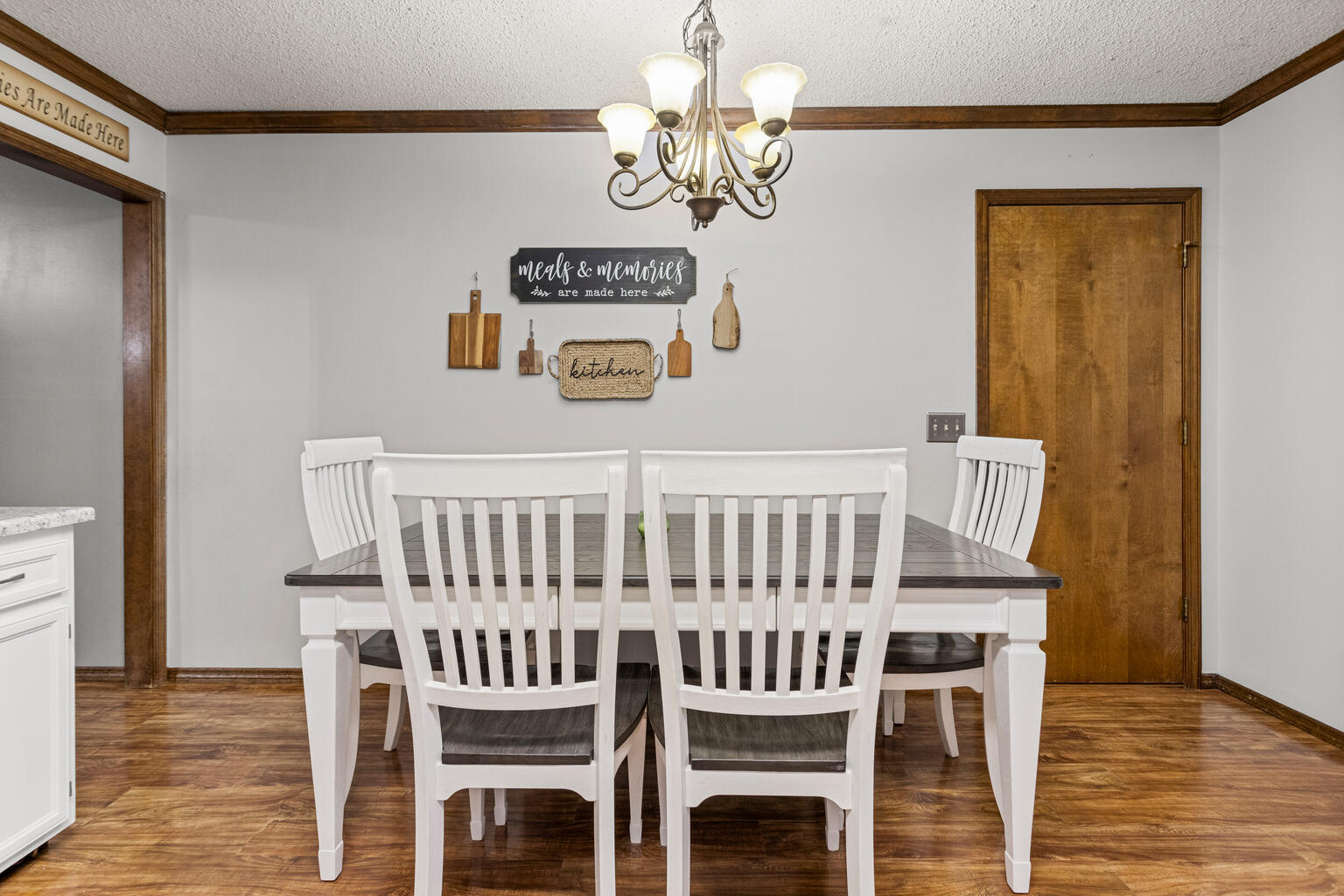 2717 East Main Street Decatur, IL 62521 - Photo 12 of 31 a view of a dining room with furniture and wooden floor