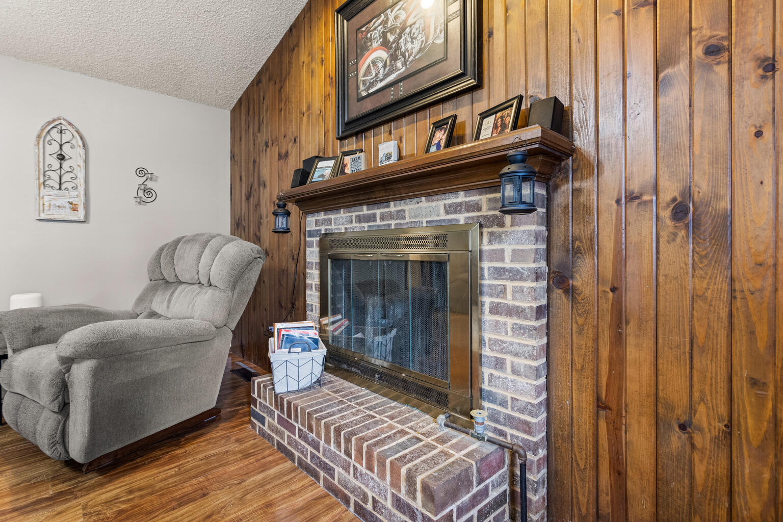 2717 East Main Street Decatur, IL 62521 - Photo 16 of 31 a living room with furniture and a fireplace
