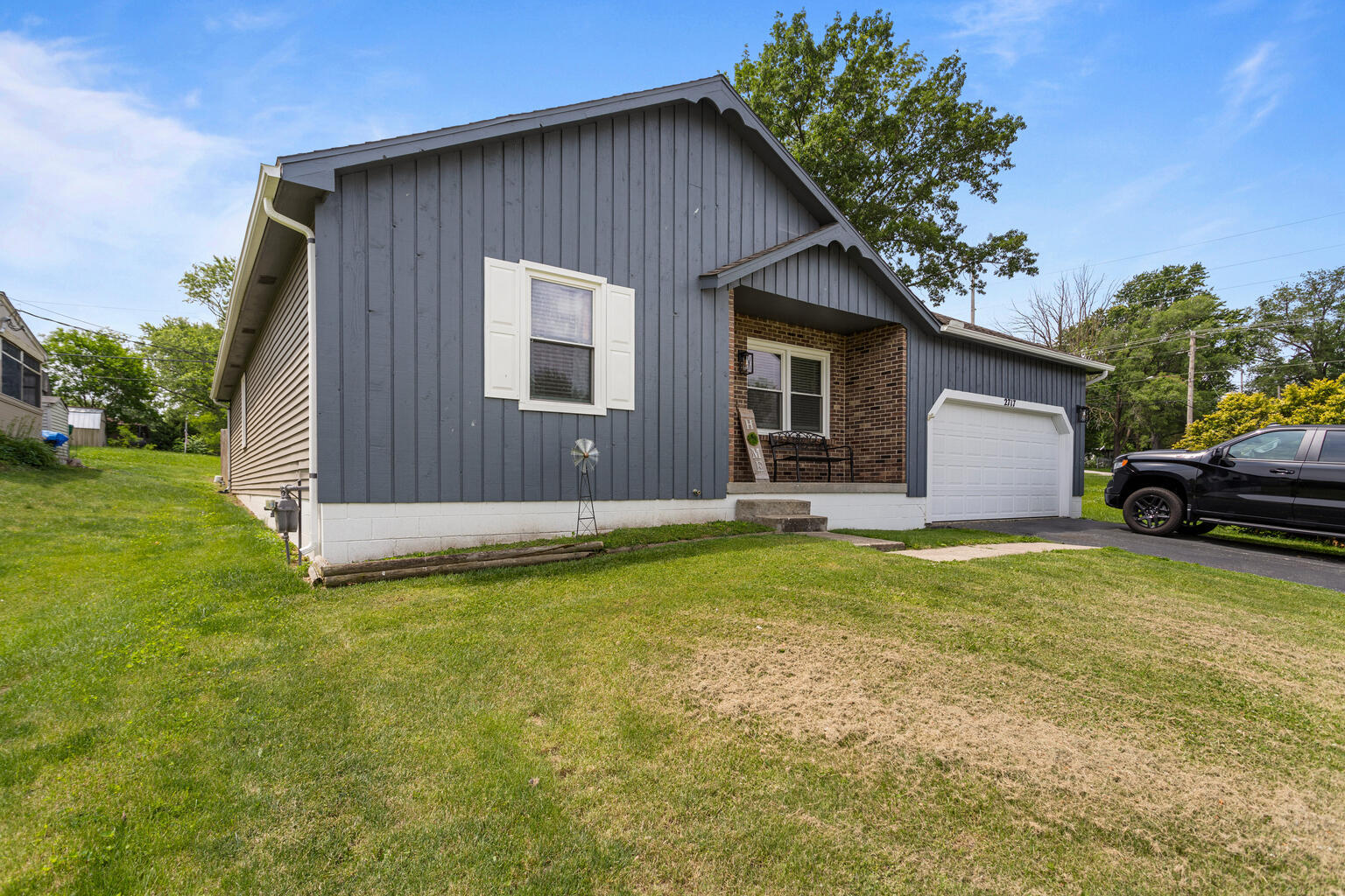 2717 East Main Street Decatur, IL 62521 - Photo 2 of 31 a house view with a garden space