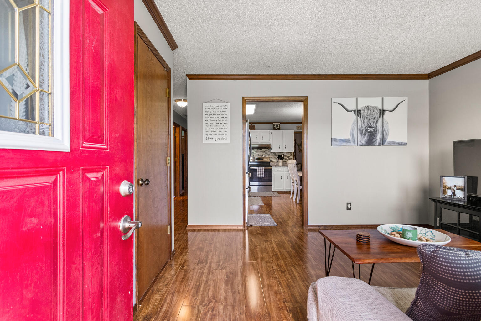 2717 East Main Street Decatur, IL 62521 - Photo 5 of 31 a room with furniture and wooden floor