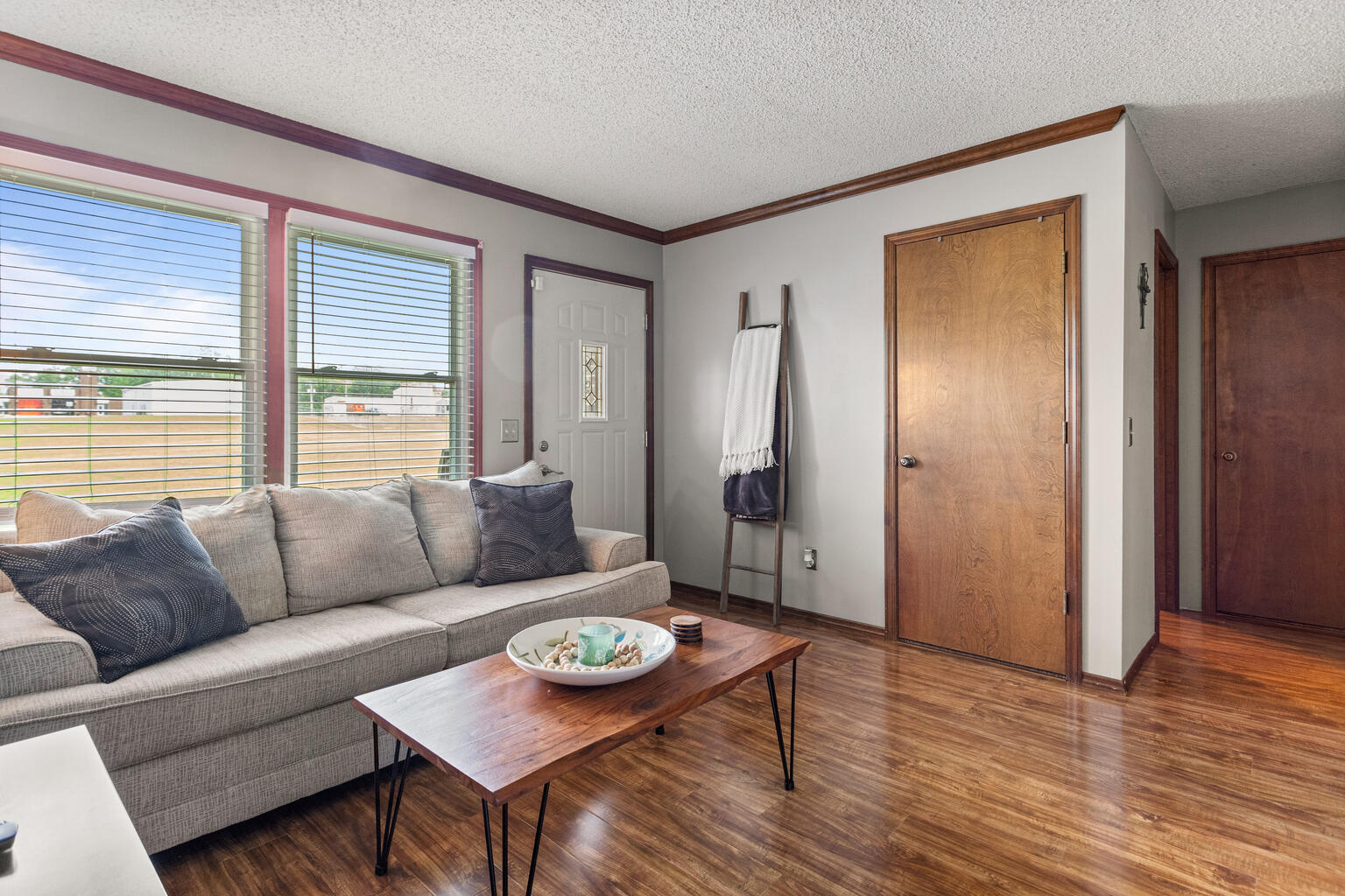 2717 East Main Street Decatur, IL 62521 - Photo 6 of 31 a living room with furniture and a window