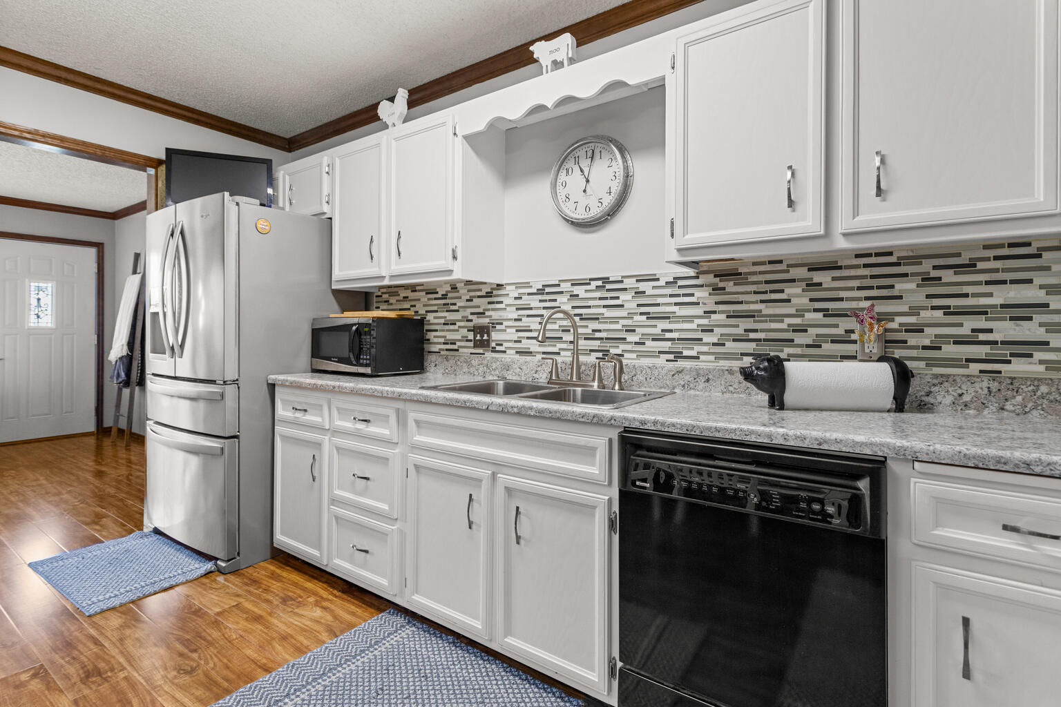2717 East Main Street Decatur, IL 62521 - Photo 10 of 31 a kitchen with a refrigerator and a stove