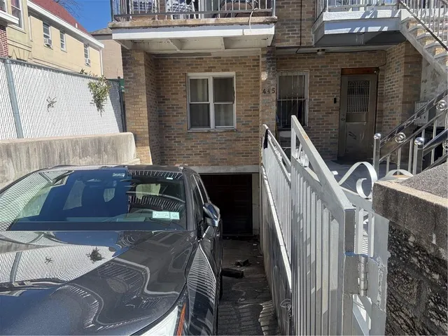 a view of a house with a garage