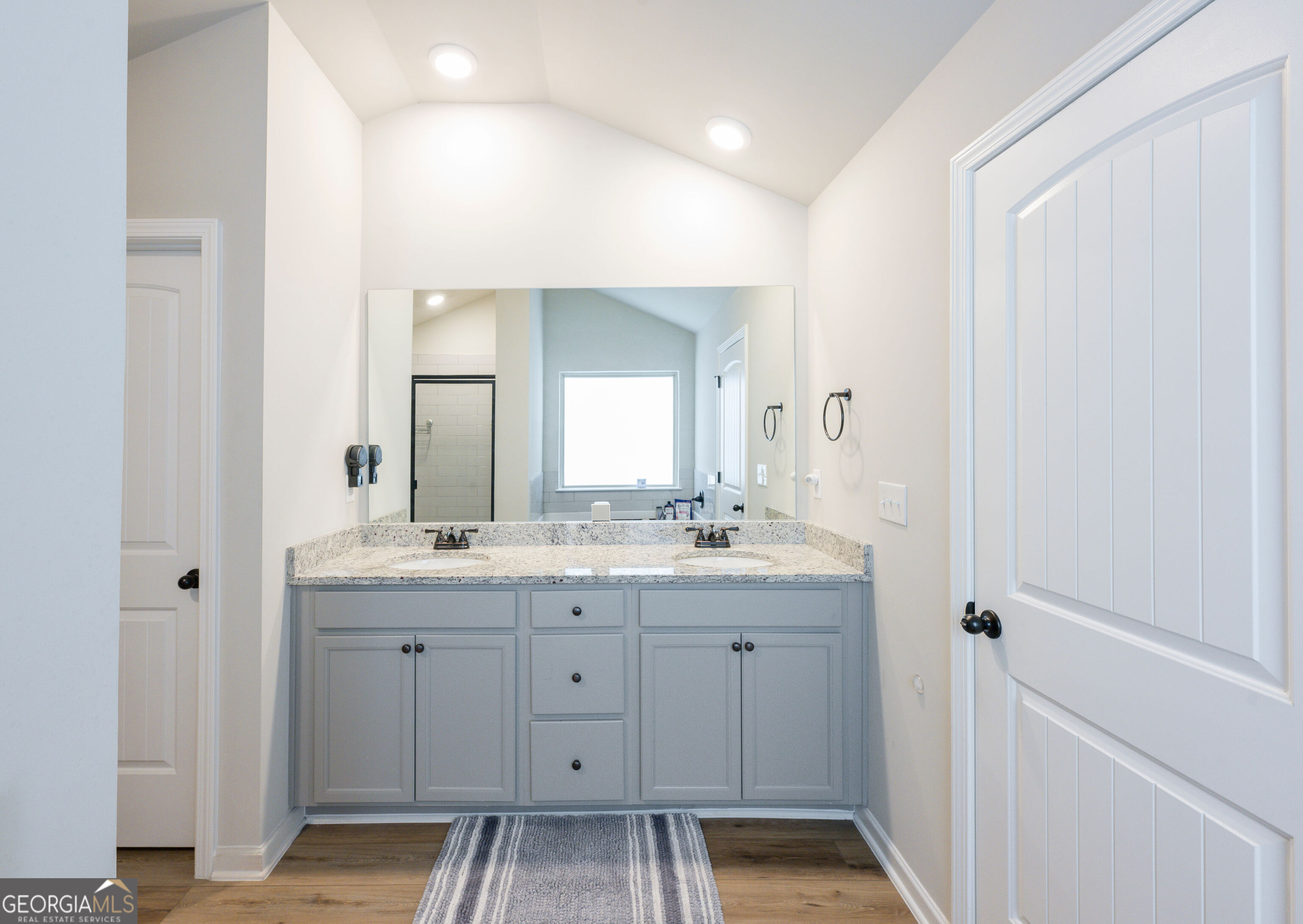 10155 Cormac Street Jonesboro, GA 30238 - Photo 27 of 40 a view of room with a sink and mirror