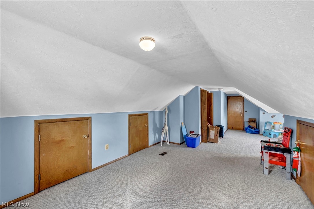 30002 Barjode Road Willowick, OH 44095 - Photo 25 of 33 Additional living space with carpet and a textured ceiling
