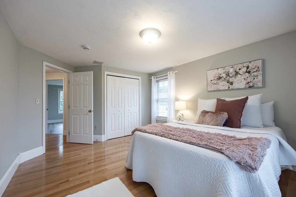 85 Sheldonville Road North Attleboro, MA 02760 - Photo 29 of 42 a bedroom with a bed and a painting on the wall