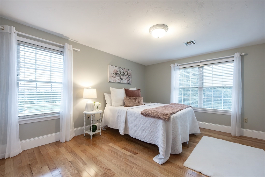 85 Sheldonville Road North Attleboro, MA 02760 - Photo 30 of 42 a spacious bedroom with a bed and a large window