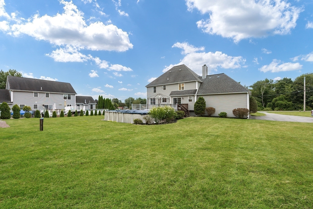 85 Sheldonville Road North Attleboro, MA 02760 - Photo 39 of 42 a front view of a house with a yard