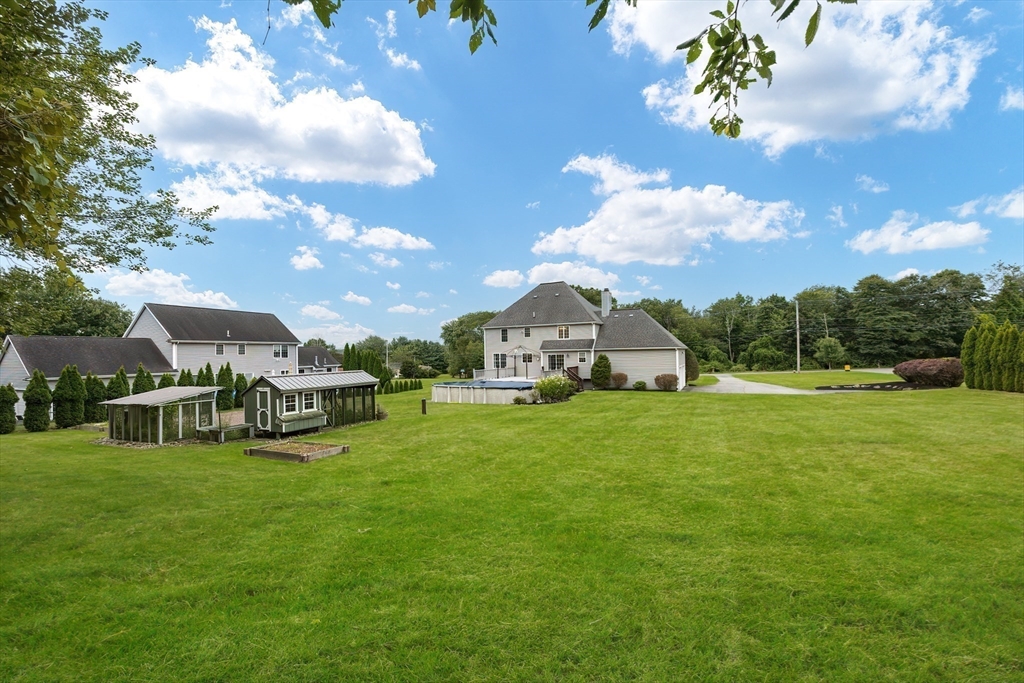 85 Sheldonville Road North Attleboro, MA 02760 - Photo 40 of 42 a view of a house with a big yard and sitting area