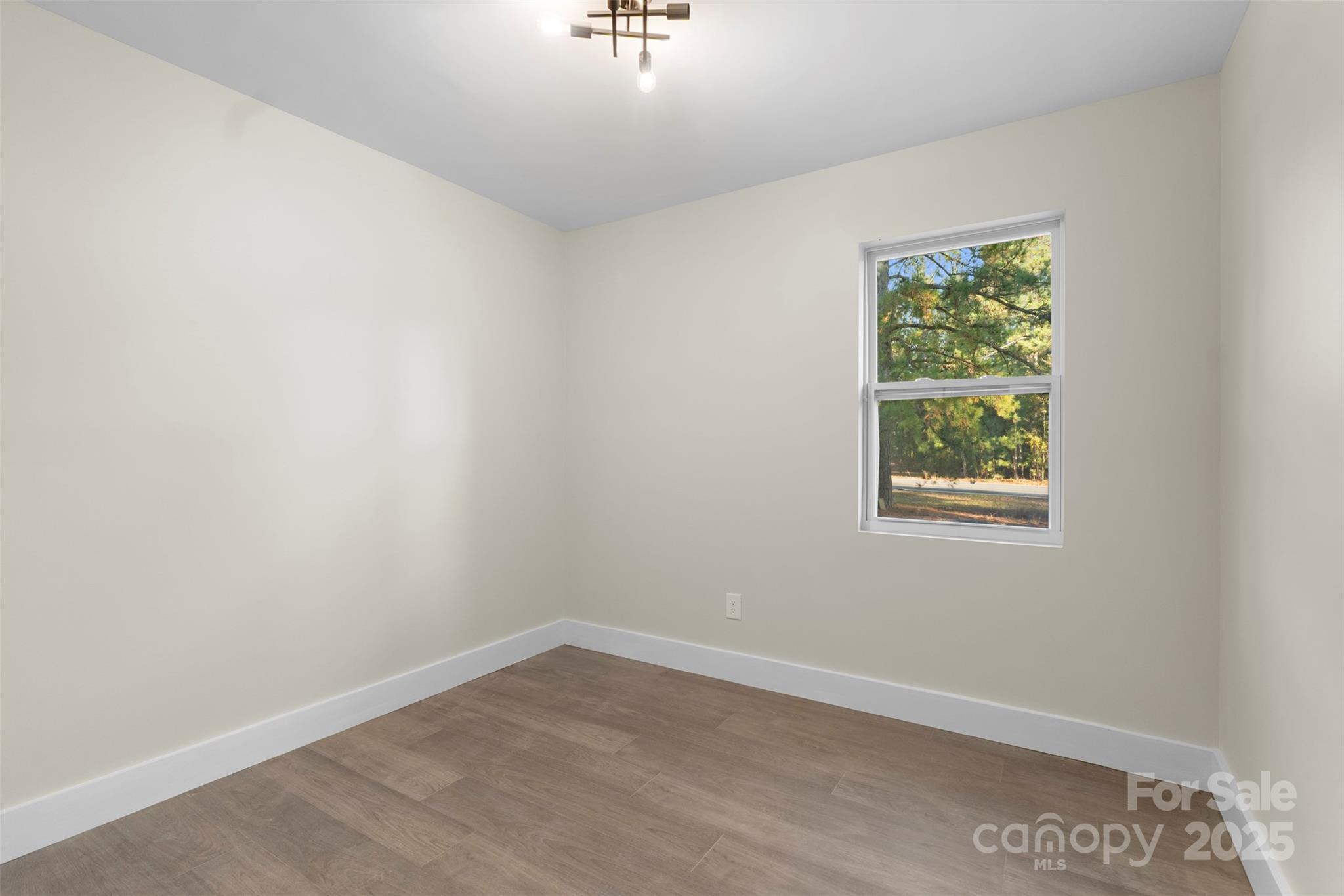 15861 Palmer Road Marston, NC 28363 - Photo 11 of 28 an empty room with a window