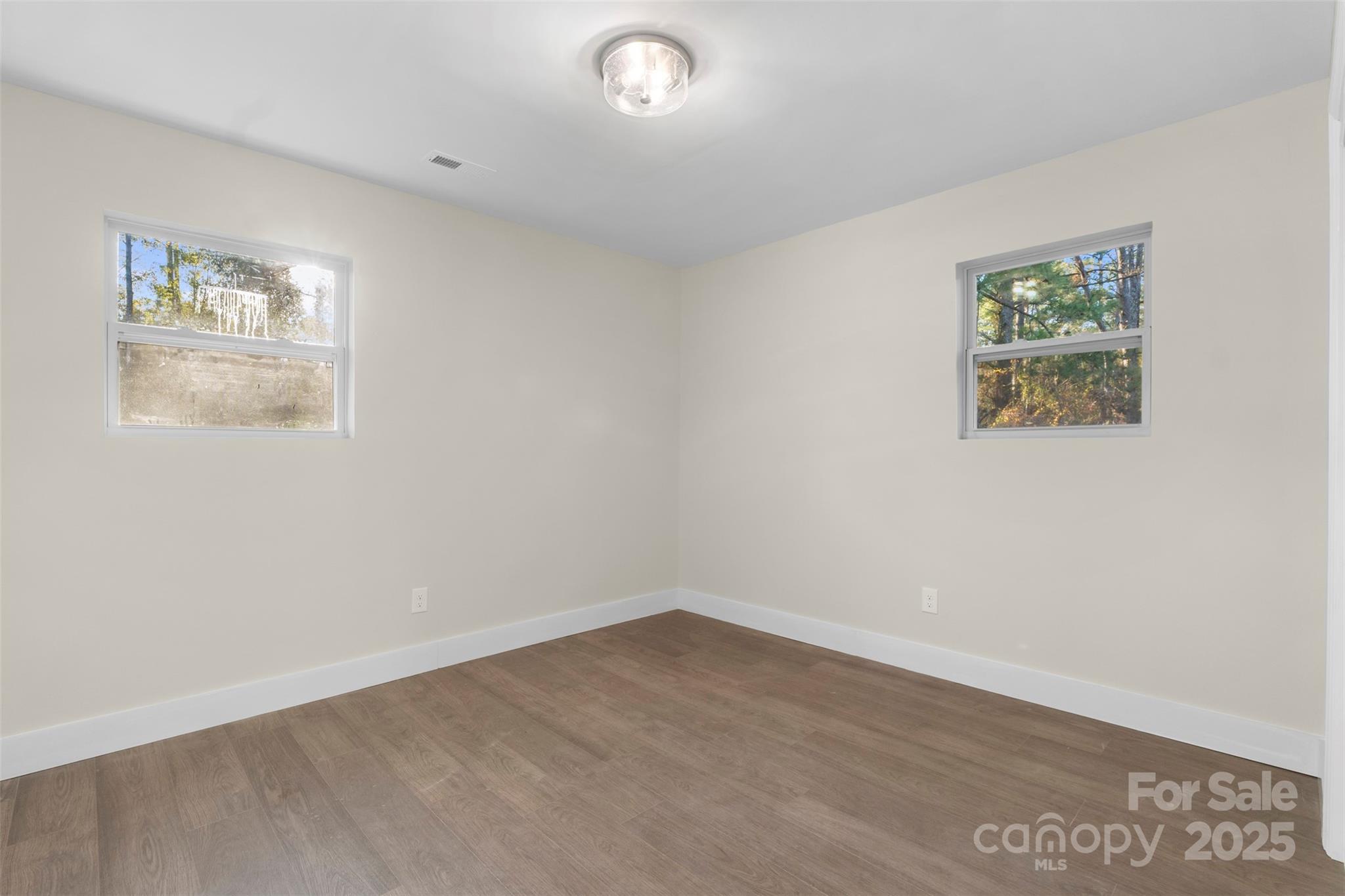 15861 Palmer Road Marston, NC 28363 - Photo 13 of 28 an empty room with a painting on the wall