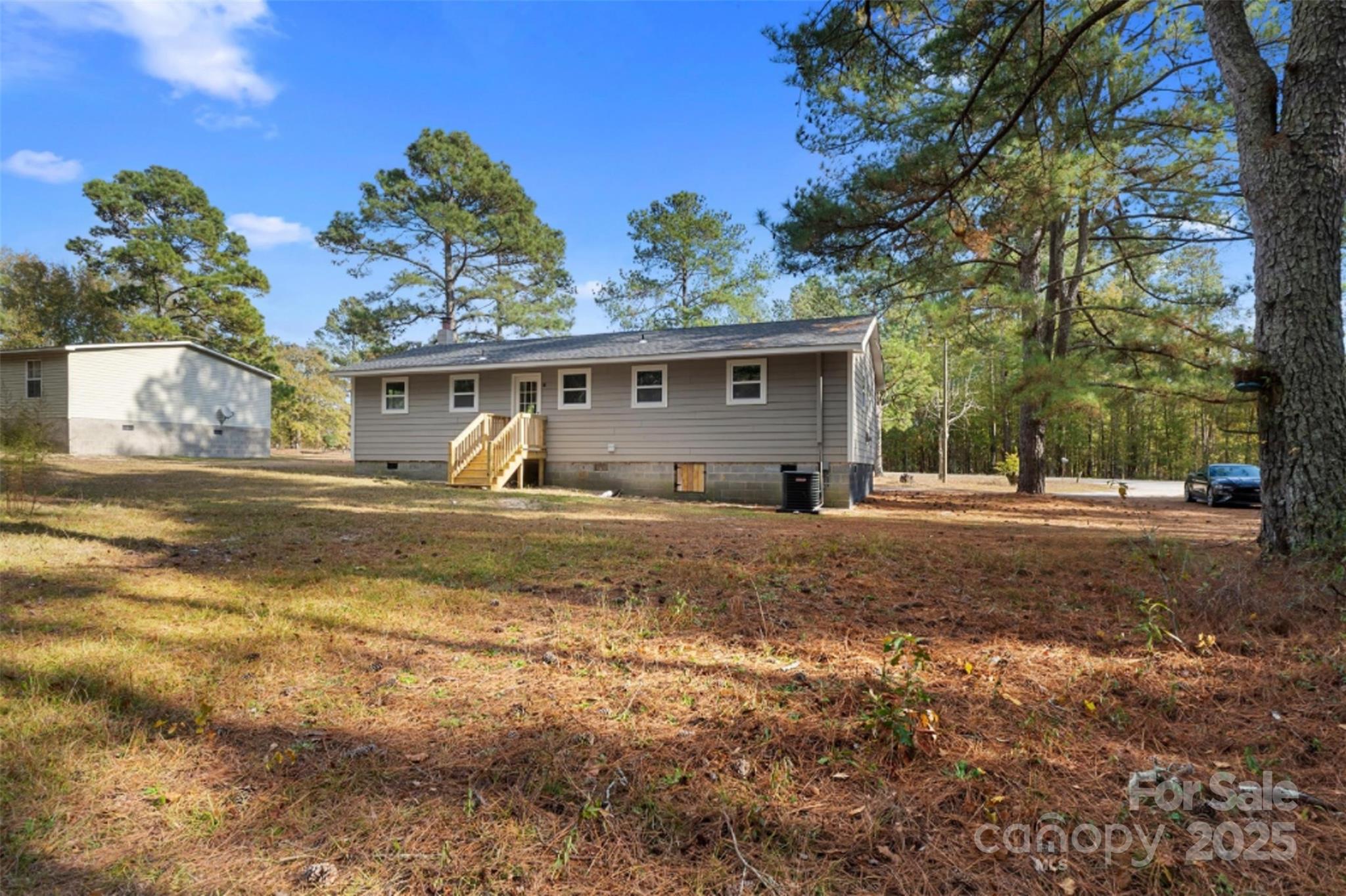 15861 Palmer Road Marston, NC 28363 - Photo 17 of 28 a front view of a house with a yard