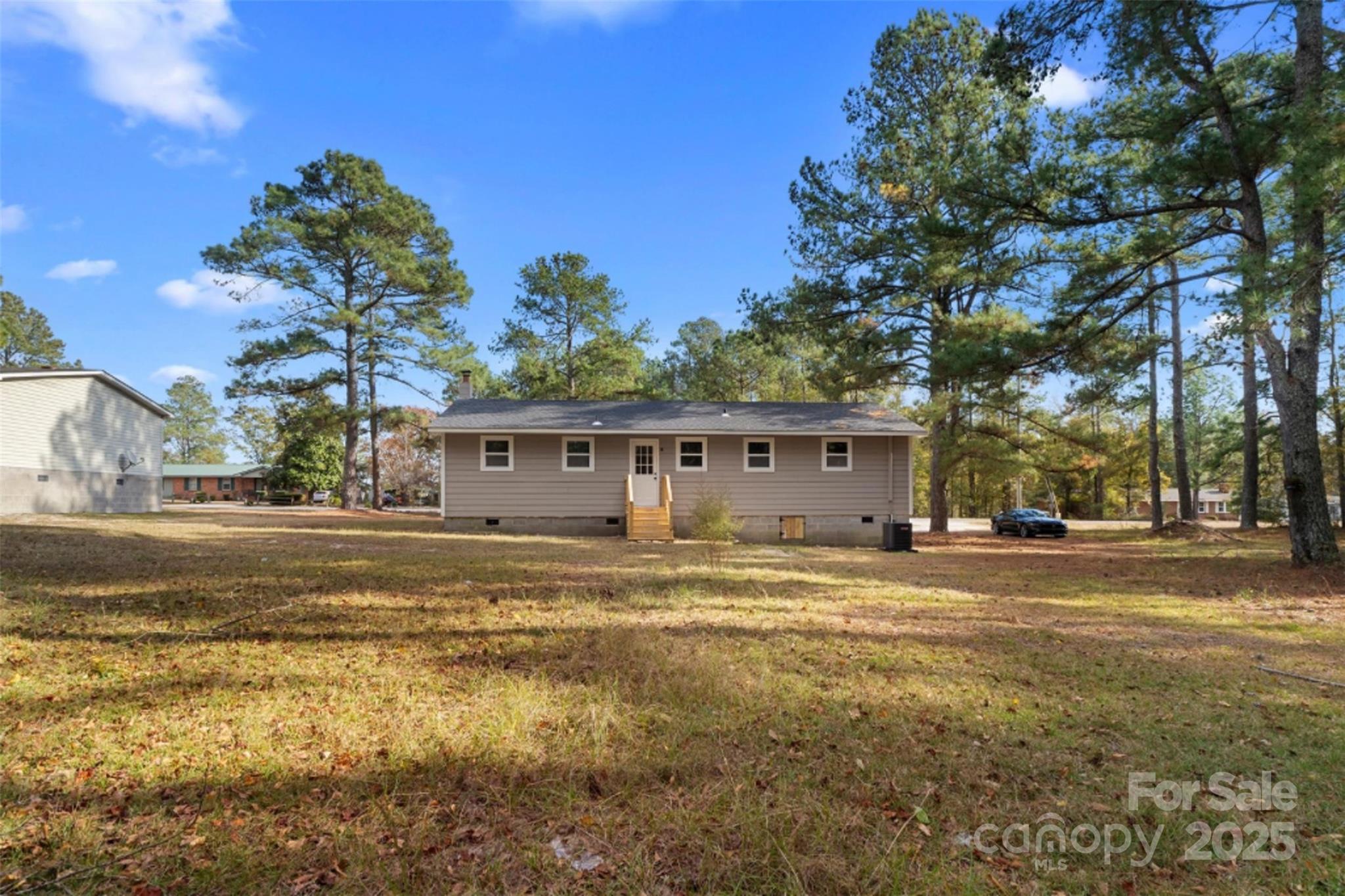 15861 Palmer Road Marston, NC 28363 - Photo 18 of 28 a view of a house with a big yard