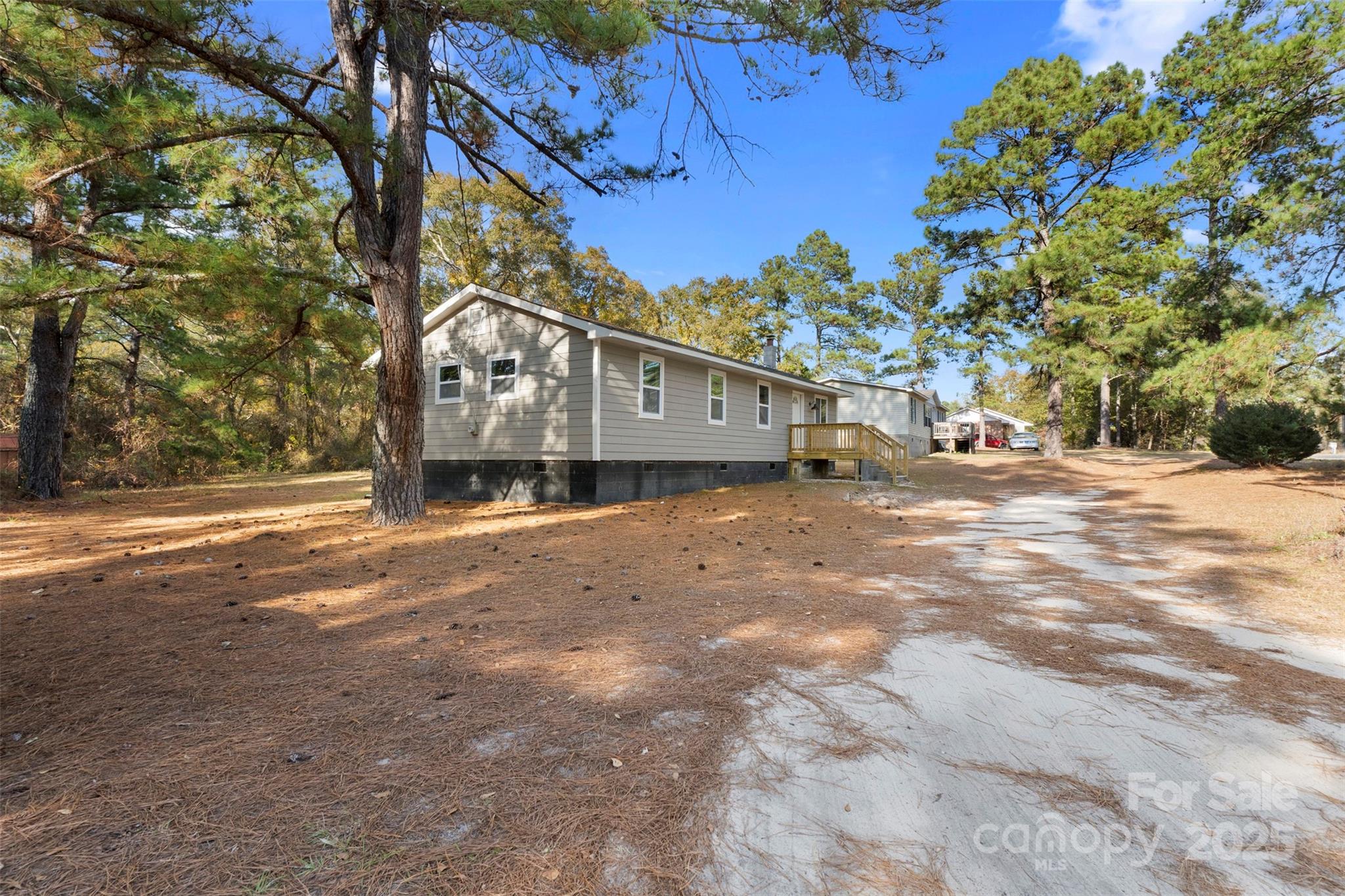 15861 Palmer Road Marston, NC 28363 - Photo 4 of 28 a view of a house with a yard
