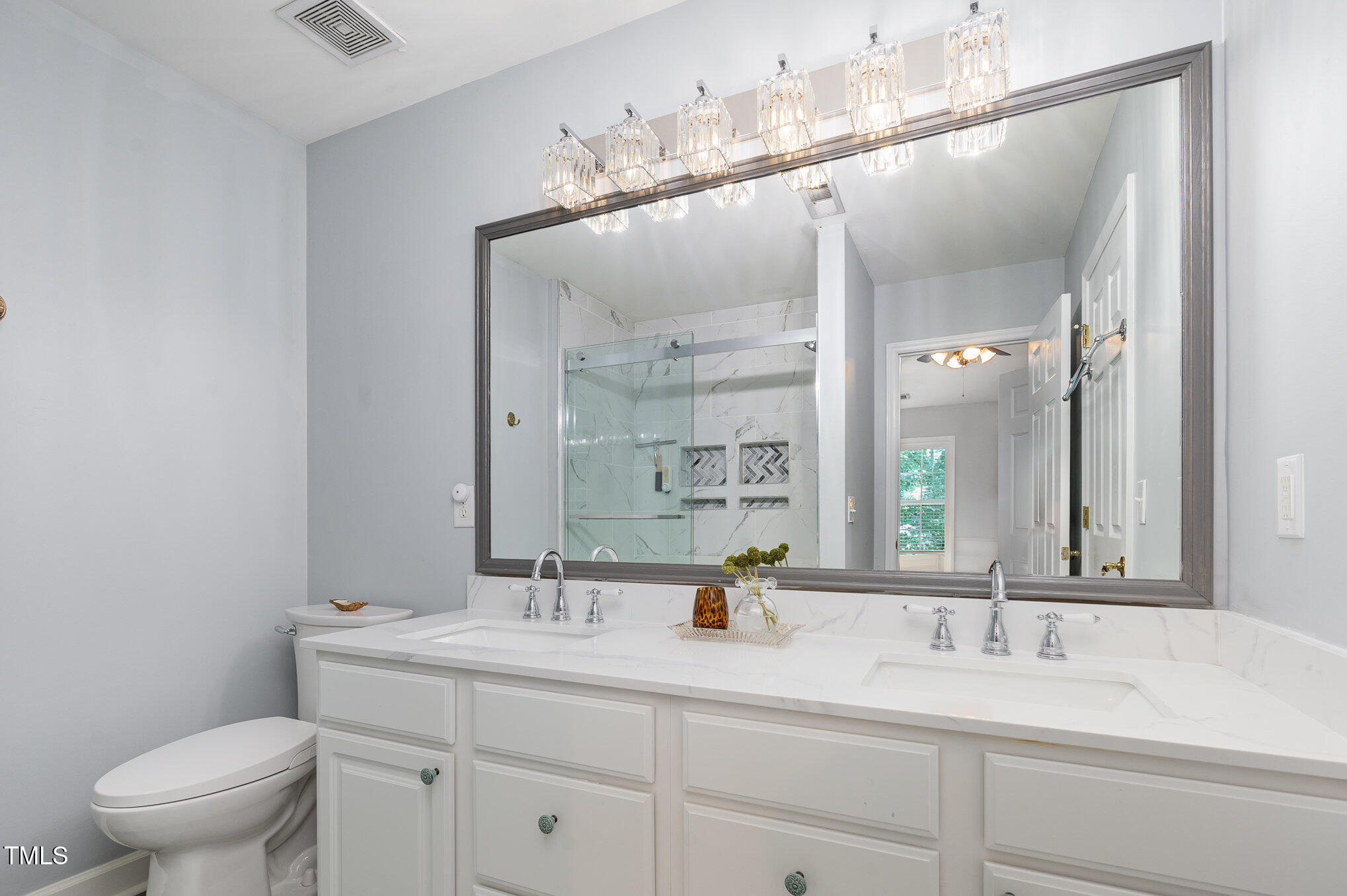 5427 Vista View Court Raleigh, NC 27612 - Photo 12 of 19 Beautifully renovated bathroom on second floor.