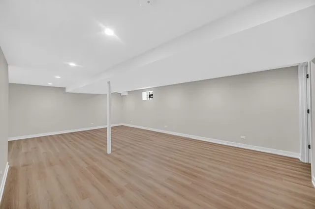 a view of a house with a yard and stairs